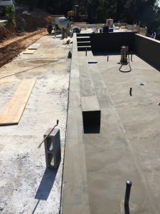Preparazione della vasca interrata per la piscina